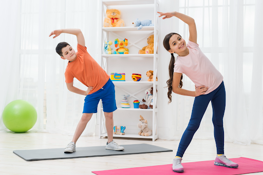 Kids are practising Yoga.